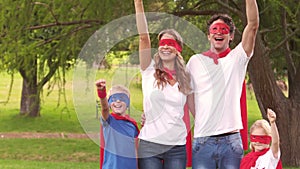 Family pretending to be superhero