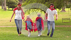 Family pretending to be superhero