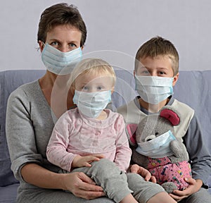 Family in protective masks