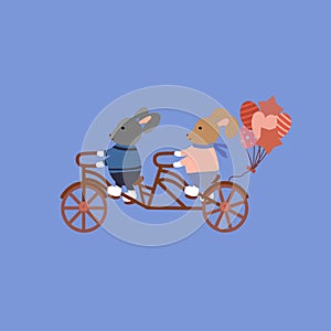 A family of rabbits on a tandem bike with balloons