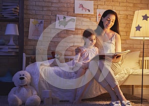 Family reading bedtime.