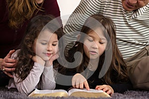 Family Reading the Bible together