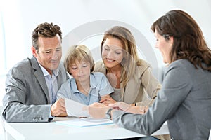 Family with real-estate agent