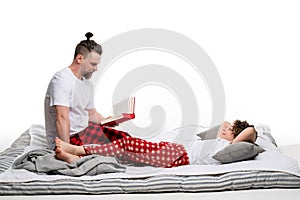 Family in red plaid sleepwears