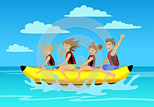 Family riding banana boat. summer vacation time