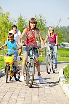 Family riding bicycles