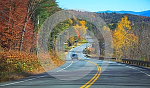 Family Road Trip, Scenic Drive with view of Colorful Autumn Leaves Color Season Scenery. Holiday, Vacation, Leisure Travel in