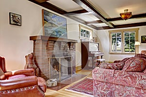 Family room with antique furniture and fireplace