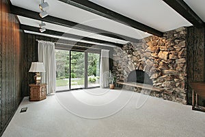 Family room with stone fireplace