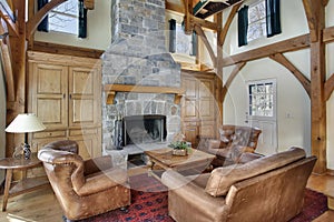 Family room with wood beams photo