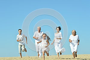 Family on sand beach