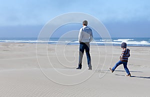 Family in sand dunes