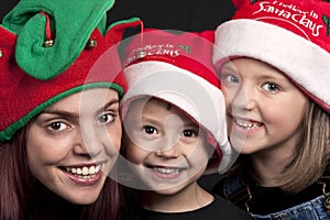 Family in Santa Claus hats