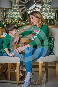 Family scene mom  and kid , Christmas time