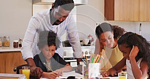 Family, school homework and children with parents for help with learning, lesson and studying at home. Education