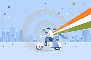 A family, holding the flying Indian tricolour flag, travelling in a scooter