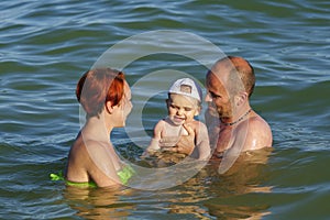 Family in sea water