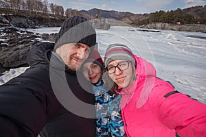 Family selfie at winter journey.