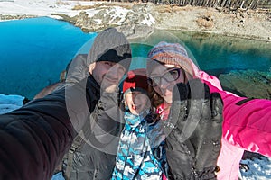 Family selfie at winter journey.