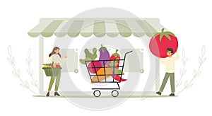 Family shopping concept. man and woman buy products from online store. Full shopping trolley