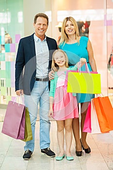 Family in shopping mall.