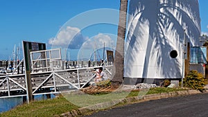 Family Sightseeing In Front Of Lighthouse