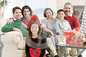 Family Sitting Around A Coffee Table