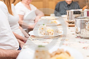 Family sitting and having a dinner