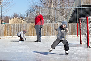 Family at a skating rink