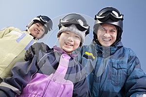 Family in Ski Resort, low angle view portrait