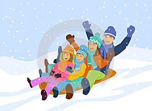 Family sledding downhill