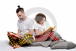 Family in sleepwear spend time together