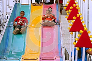 Family Slides Down Fun Slide At Atlanta Fair