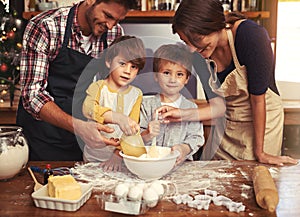 Family, smile and portrait of kids baking in kitchen, learning or happy boys bonding together with parents in home
