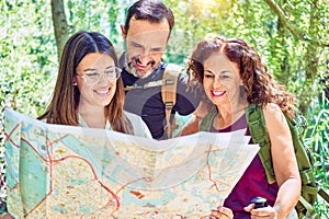 Family smiling happy hiking at the forest