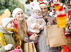 Family spending time at Christmas fair