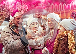 Family spending time at Christmas fair