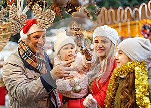 Family spending time at Christmas fair