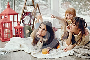 Family spending time at home in a christmas decorations