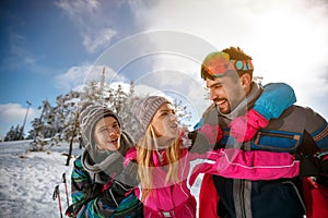 Family spending time together and enjoying in winter vacations