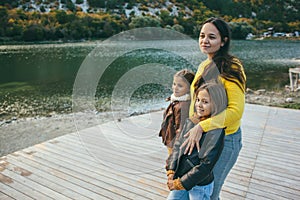 Family spending time together by the lake