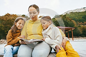 Family spending time together by the lake