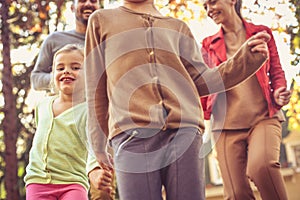 Family spending time together outside. Have fun together.