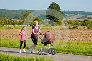 Family sport - jogging with baby stroller