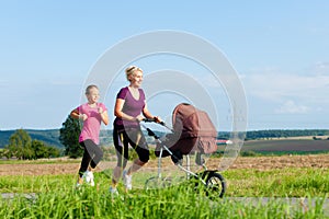 Family sport - jogging with baby stroller