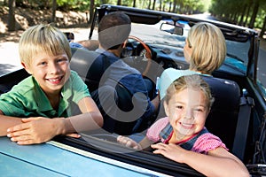 Family in sports car