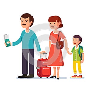 Family standing with boarding spinner wheeled bag