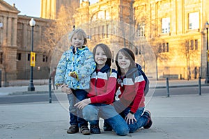 Family, standing in front of national museum in Barcelona, happy family holiday with children
