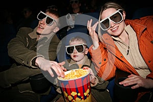 Family in stereo cinema