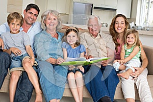 Family with storybook at home